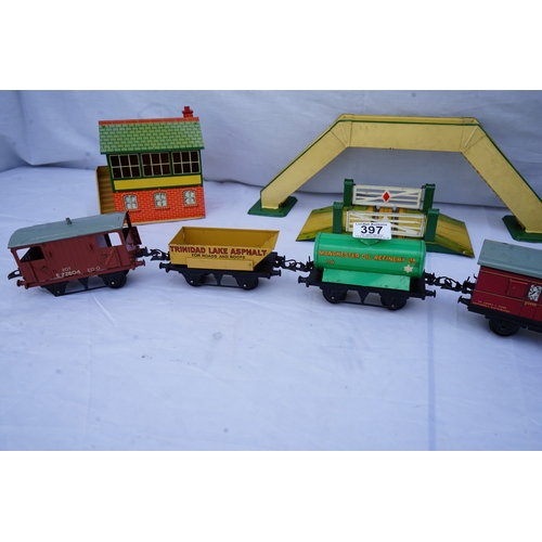 397 - Hornby: A collection of O Gauge Trains and Scenery Items . Each Piece is Individually Boxed in its o... 