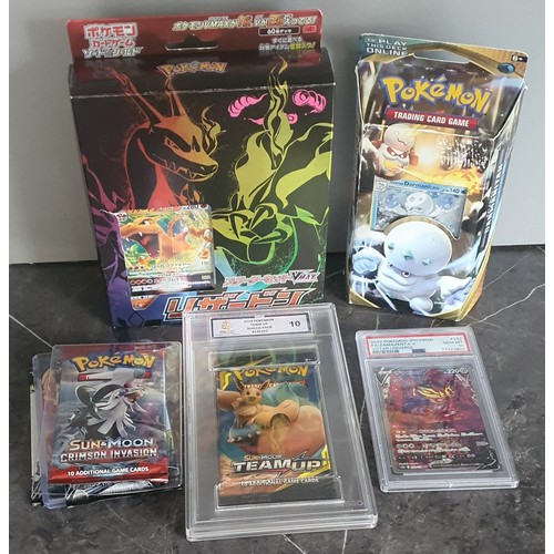 3 - Pokemon Trading Card lot Inc graded pack, deck boxes, 5 sealed packs etc.