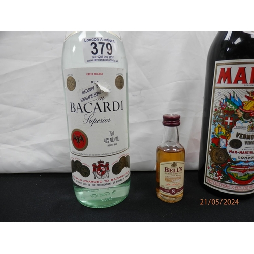 379 - Bottle of Bacardi Rum and a Bottle of Martini