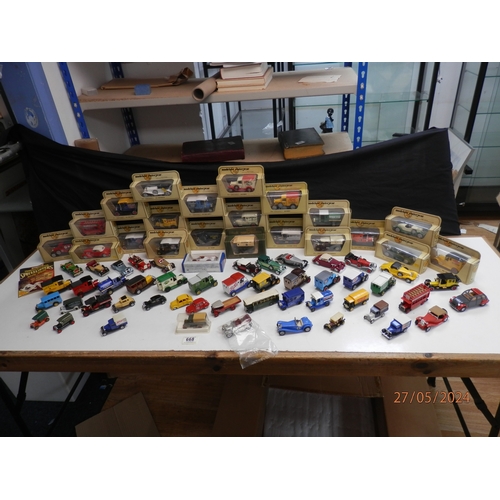 668 - Good Collection of Boxed Diecast Cars and Vehicles