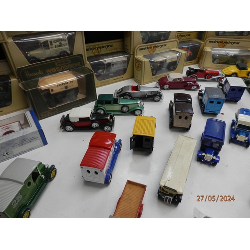 668 - Good Collection of Boxed Diecast Cars and Vehicles