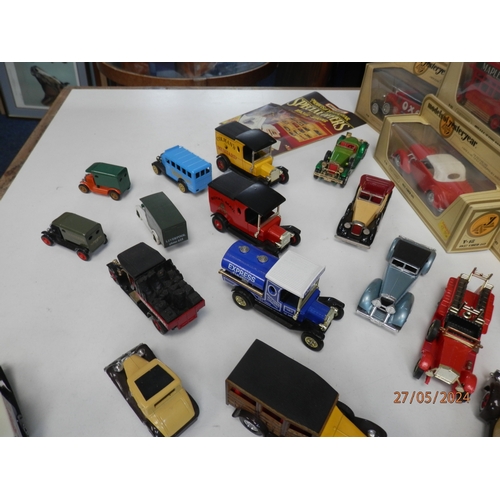 668 - Good Collection of Boxed Diecast Cars and Vehicles