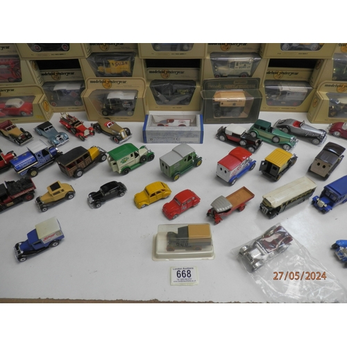 668 - Good Collection of Boxed Diecast Cars and Vehicles