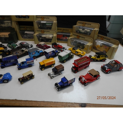 668 - Good Collection of Boxed Diecast Cars and Vehicles