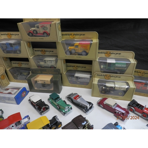 668 - Good Collection of Boxed Diecast Cars and Vehicles