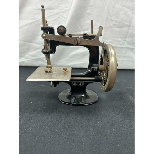 353 - A Small Singer Desk Mounted Sewing Machine