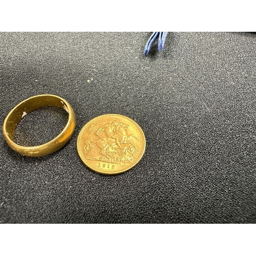 57 - 1912 Half Sovereign Coin and a 22ct Gold Wedding Band Size M  
Half Sovereign 3.99g
Ring 5.6g