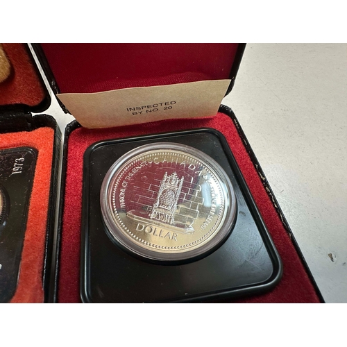 687 - 1977 Canadian Dollar Silver Proof Coin and a Canadian Centenary Silver Dollar both Cased