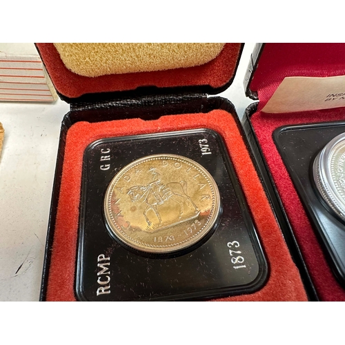 687 - 1977 Canadian Dollar Silver Proof Coin and a Canadian Centenary Silver Dollar both Cased