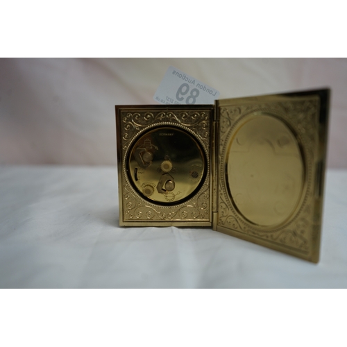 89 - Mother of Pearl Face Brass Clock in the form of a Book