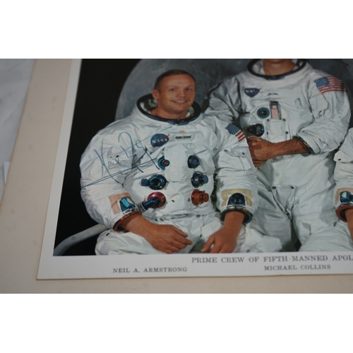 Photograph of the Fifth Manned Apollo Mission Crew Signed by Neil Armstrong