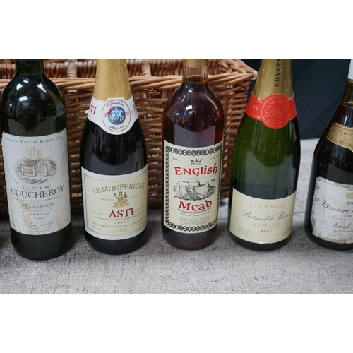 166 - Vintage Wicker Basket of wines and other bottles including English Mead, Bertrand de Bessac Champagn... 