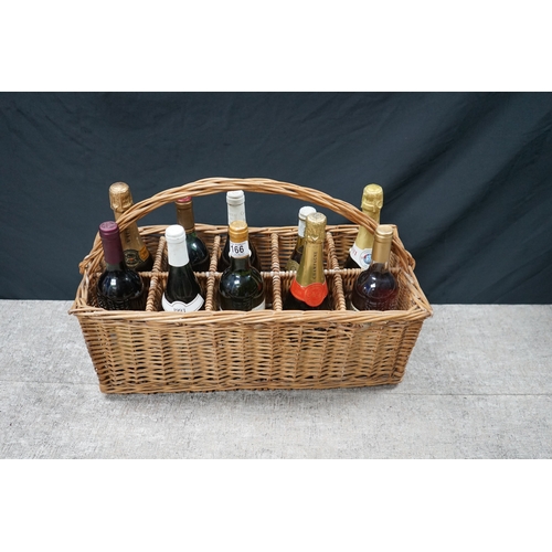 166 - Vintage Wicker Basket of wines and other bottles including English Mead, Bertrand de Bessac Champagn... 