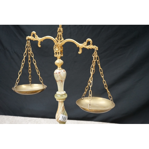 169 - Decorative balance scale with marble base and brass details.