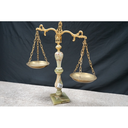 169 - Decorative balance scale with marble base and brass details.