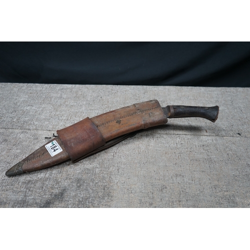 184 - A World War II Kukri knife the blade stamped Pioneer Calcutta 1942, with Scabbard and Holster Stampe... 