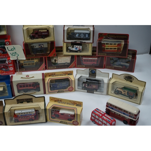 103 - Collection of die-cast model vehicles including various buses, trucks, and emergency vehicles, mostl... 