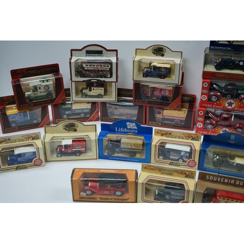 103 - Collection of die-cast model vehicles including various buses, trucks, and emergency vehicles, mostl... 