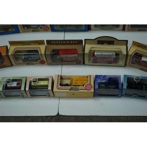 103 - Collection of die-cast model vehicles including various buses, trucks, and emergency vehicles, mostl... 