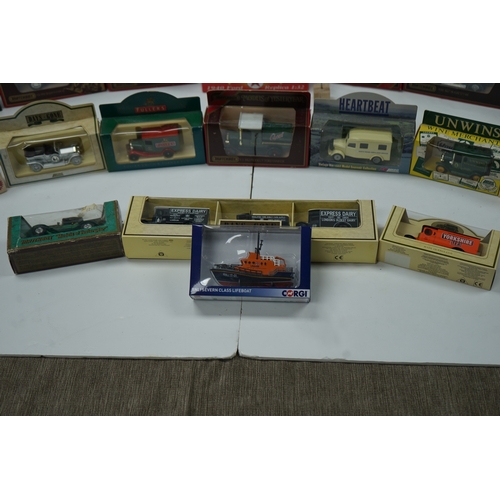 105 - Collection of die-cast model vehicles from Corgi, Lledo, and others including vintage cars, trucks, ... 