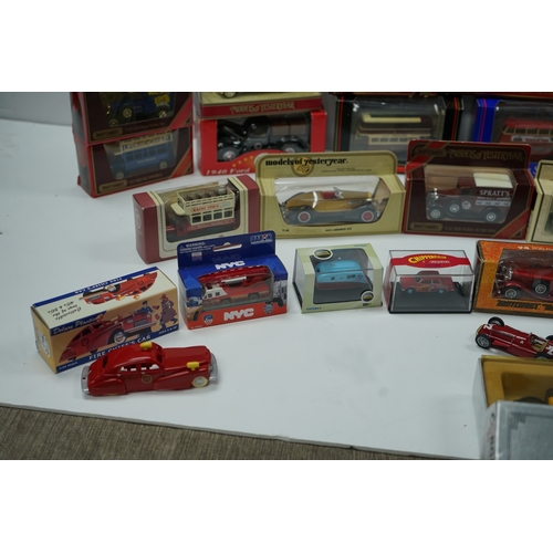 106 - Collection of die-cast model vehicles, mostly by Corgi, including buses, cars, and trucks.