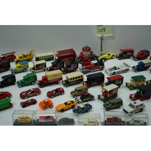 109 - Collection of toy model vehicles including various cars, buses, and trucks, some in original packagi... 