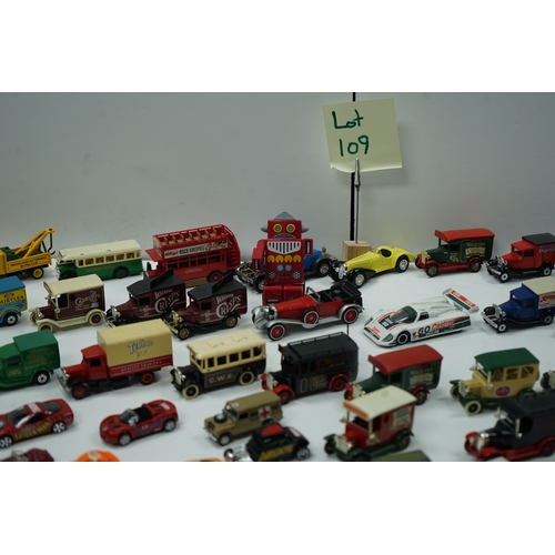 109 - Collection of toy model vehicles including various cars, buses, and trucks, some in original packagi... 