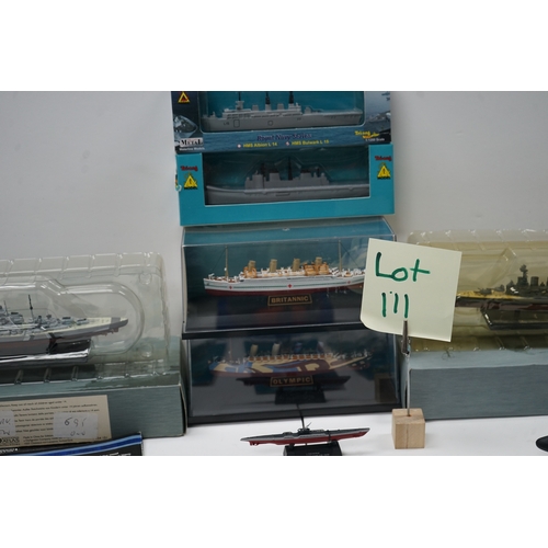 111 - Collection of die-cast ship and submarine models, including items by Tri-ang Minic Ships.