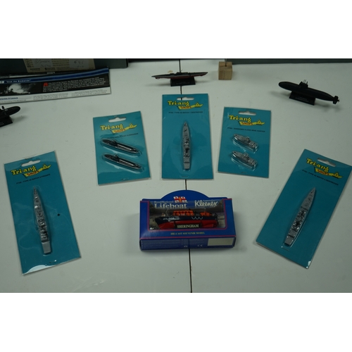 111 - Collection of die-cast ship and submarine models, including items by Tri-ang Minic Ships.