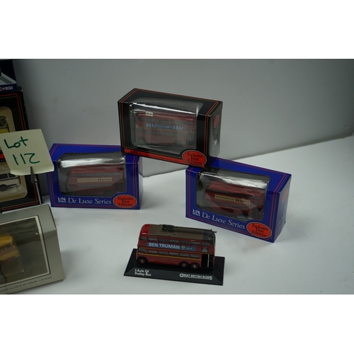 112 - Collection of model buses and trams, including Corgi Original Omnibus and De Luxe Series editions.