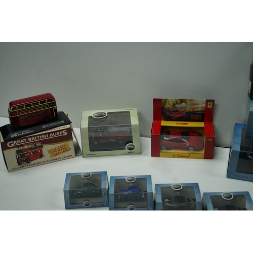 113 - Collection of die-cast model vehicles, including Oxford, Dinky Toys, and Ferrari.