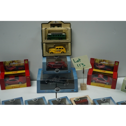 113 - Collection of die-cast model vehicles, including Oxford, Dinky Toys, and Ferrari.