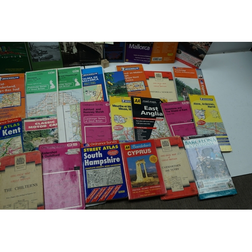 114 - Collection of maps and travel guides including Michelin, AA Road Maps, and Ordnance Survey maps.