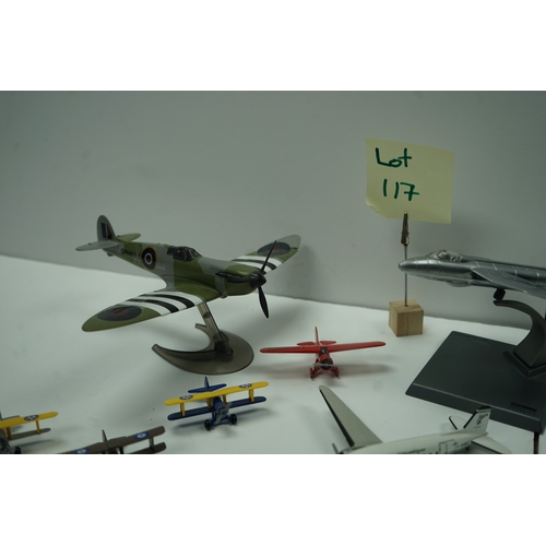 117 - Collection of model airplanes, including various biplanes, a Concorde model, and military aircraft.