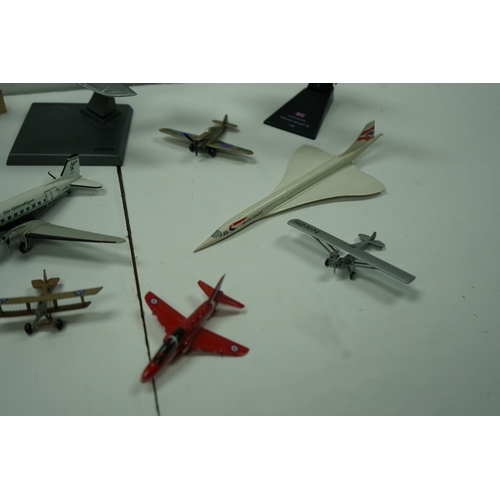 117 - Collection of model airplanes, including various biplanes, a Concorde model, and military aircraft.