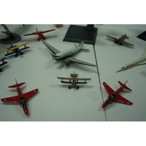 117 - Collection of model airplanes, including various biplanes, a Concorde model, and military aircraft.