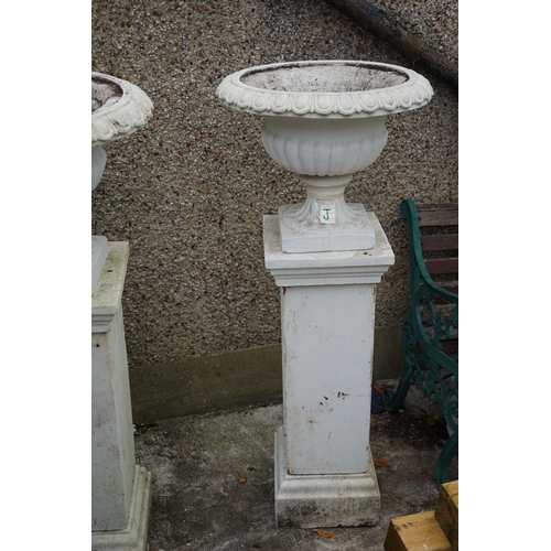 1183 - Gardens, Pots & Planters: A Pair of Victorian Style urns on pedestals.  (128cm T x 54cm Dia.)