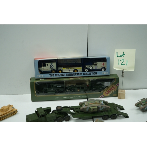 121 - Collection of military vehicle and aircraft models, including tanks, trucks, and planes. Also includ... 