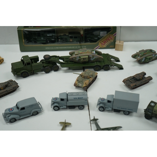 121 - Collection of military vehicle and aircraft models, including tanks, trucks, and planes. Also includ... 