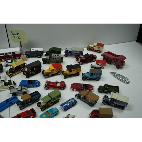 122 - Collection of miniature vehicles including cars, trucks, buses, and vans.