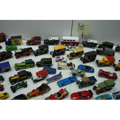 122 - Collection of miniature vehicles including cars, trucks, buses, and vans.