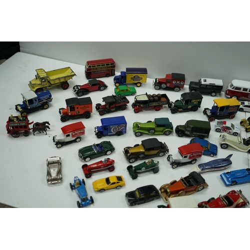 122 - Collection of miniature vehicles including cars, trucks, buses, and vans.