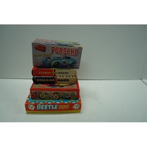 412 - Collection of vintage toys and games including Porsche Remote Control car, Airfix German Infantry fi... 