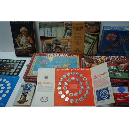 422 - Collection of vintage board games and coin collections including Wordsworth, World Map Puzzle, Othel... 