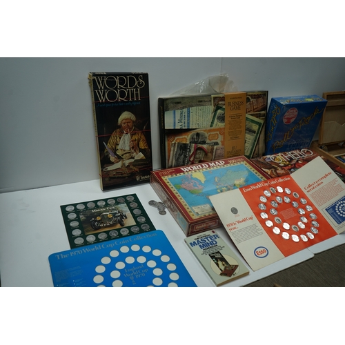 422 - Collection of vintage board games and coin collections including Wordsworth, World Map Puzzle, Othel... 