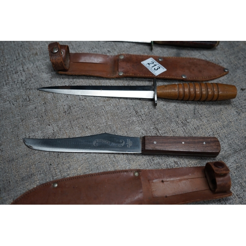 213 - Pair of Unmarked Commando Knives in Sheaths and a Bushmans Friend Knife in Sheath