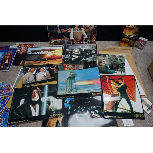 312 - Collection of movie and TV show memorabilia including Star Wars figures, Indiana Jones poster, Buffy... 