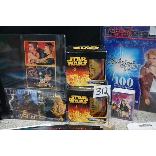 312 - Collection of movie and TV show memorabilia including Star Wars figures, Indiana Jones poster, Buffy... 