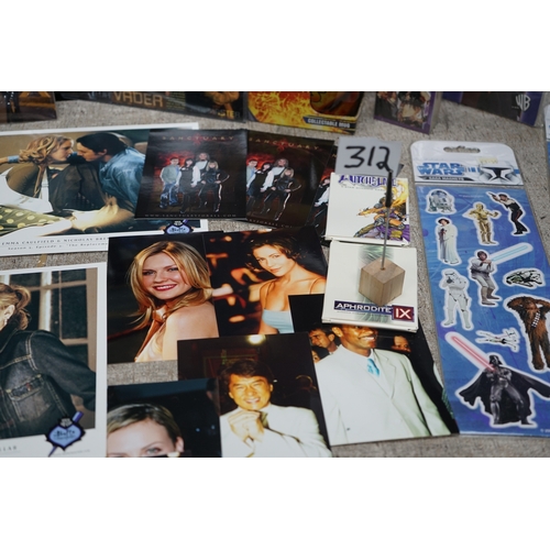 312 - Collection of movie and TV show memorabilia including Star Wars figures, Indiana Jones poster, Buffy... 