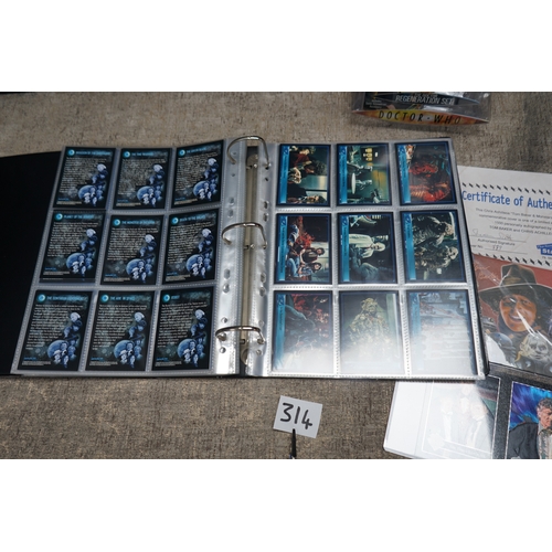 314 - Collection of Doctor Who items including trading card collection, action figure set, certificate of ... 